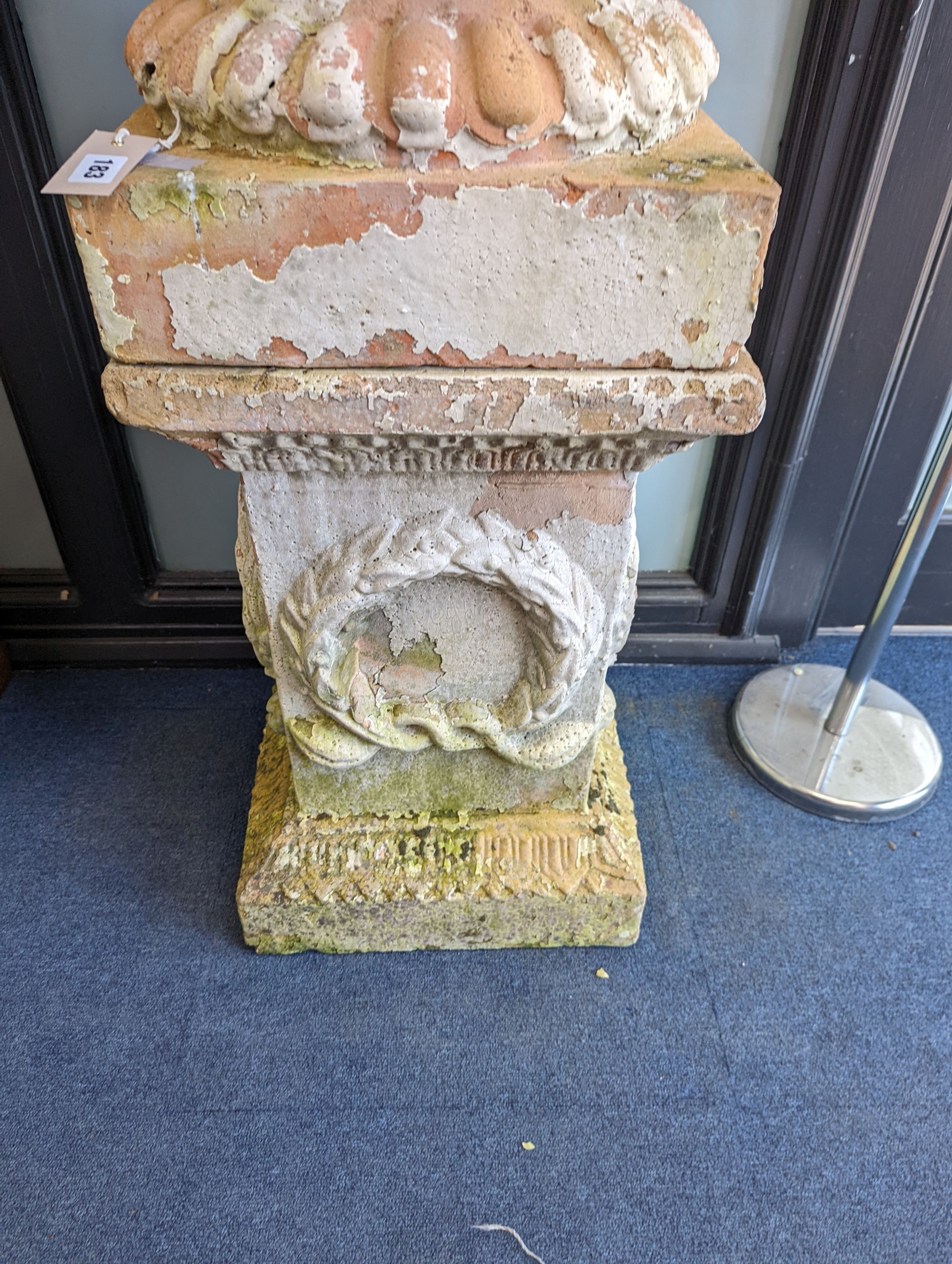 A large weathered Victorian painted terracotta lidded urn on plinth base, diameter 64cm, height 200cm